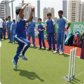 JBCN International School learners are practising cricket on turf