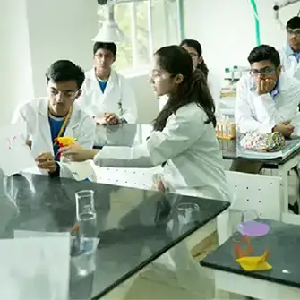 JBCN International School learners conducting experiments in the science lab