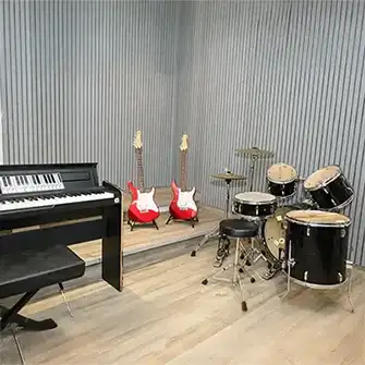 Music room at JBCN International School equipped with instruments for learners