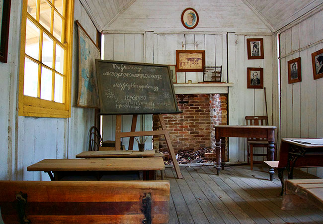 Historic school with blackboard and desks